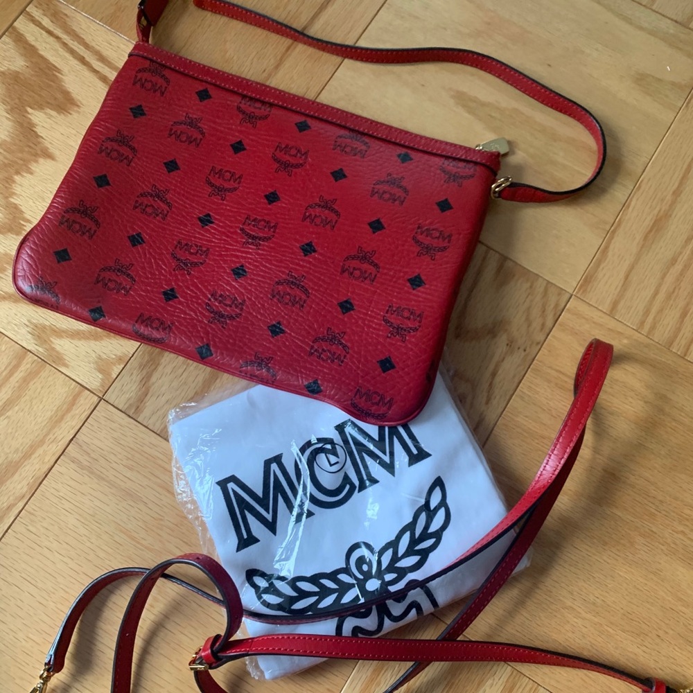 Authentic Red Mcm clutch w/Gold Hardware
